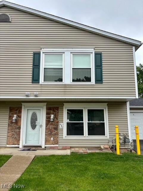 221 Canterbury Unit A38, Medina, OH 44256 - view of front of property featuring a front yard
