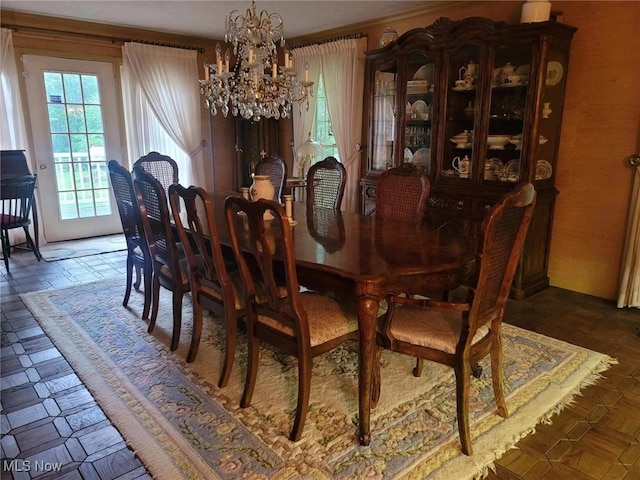 505 Woodside St SW, Hartville, OH 44632 - dining area featuring a chandelier