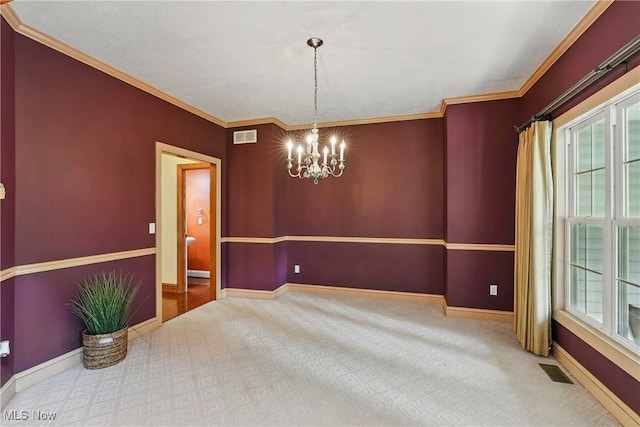 7234 Bridlewood Dr, Concord, OH 44077 - spare room featuring a chandelier, healthy amount of natural light, baseboards, and crown molding