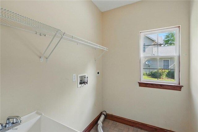 7234 Bridlewood Dr, Concord, OH 44077 - washroom with hookup for an electric dryer, baseboards, and washer hookup