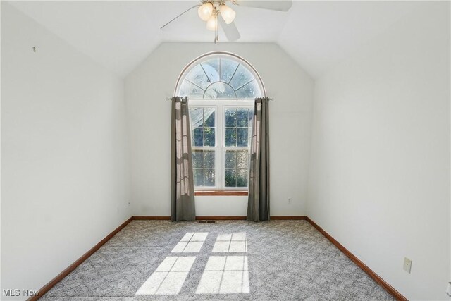 7234 Bridlewood Dr, Concord, OH 44077 - carpeted spare room with ceiling fan, vaulted ceiling, and baseboards