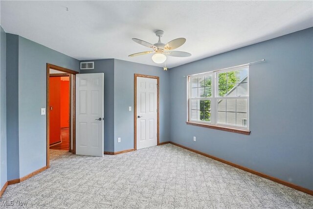 7234 Bridlewood Dr, Concord, OH 44077 - unfurnished bedroom with carpet floors, baseboards, and ceiling fan