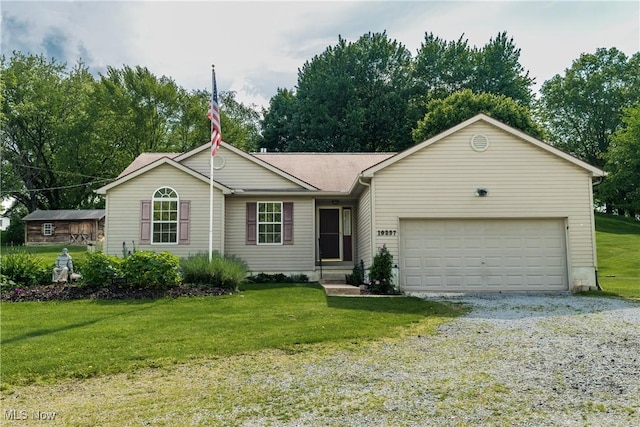 10237 Middlebranch Ave NE, Hartville, OH 44632 - ranch-style house featuring a garage, a front lawn, and driveway