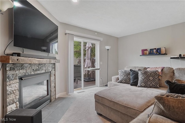 2426 Wrens Dr S, Stow, OH 44224 - carpeted living area featuring a stone fireplace