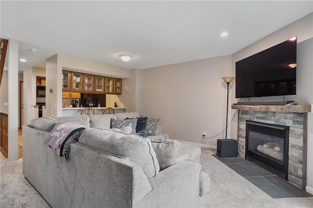 2426 Wrens Dr S, Stow, OH 44224 - living area with a fireplace, light carpet, and baseboards