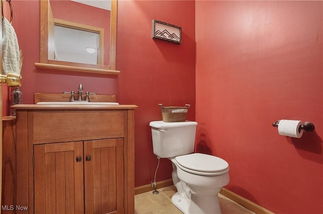 2426 Wrens Dr S, Stow, OH 44224 - bathroom with toilet, vanity, baseboards, and tile patterned floors