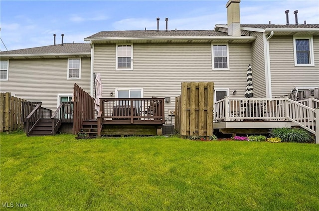 2426 Wrens Dr S, Stow, OH 44224 - rear view of house featuring a wooden deck and a chimney
