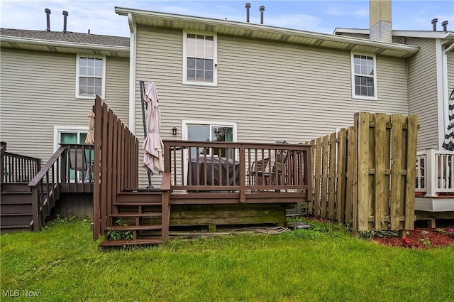 2426 Wrens Dr S, Stow, OH 44224 - rear view of house featuring a deck and a yard