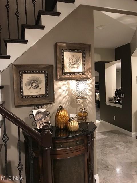 3327 Hampton Hall, Poland, OH 44514 - hallway with stairs and light marble finish floors
