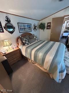 8452 E Bay Shore Rd Unit 7, Danbury, OH 43440 - bedroom with carpet floors