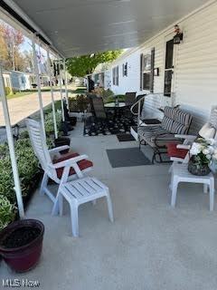 8452 E Bay Shore Rd Unit 7, Danbury, OH 43440 - view of patio