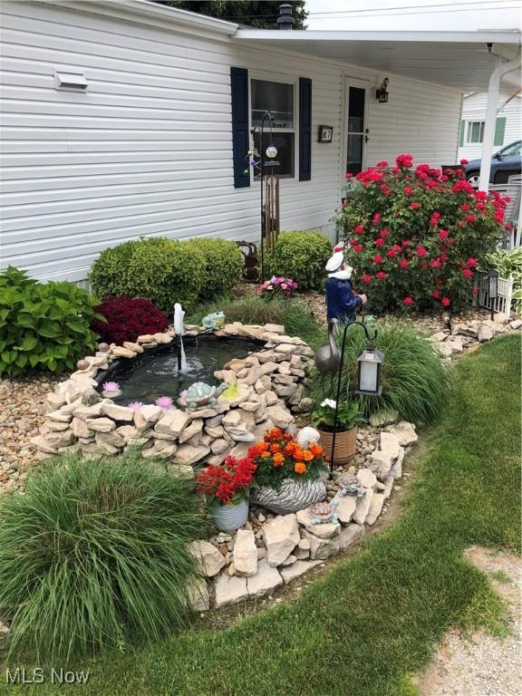 8452 E Bay Shore Rd Unit 7, Danbury, OH 43440 - entrance to property featuring covered porch