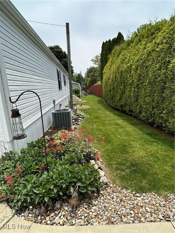 8452 E Bay Shore Rd Unit 7, Danbury, OH 43440 - view of yard featuring central air condition unit