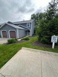 4757 Ledgewood Dr Unit 7-A, Medina, OH 44256 - view of front facade featuring driveway and an attached garage