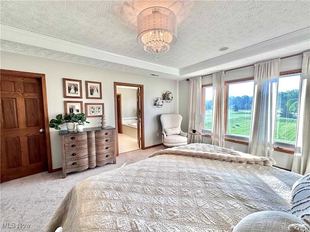 114 Mallard Creek Run, Lagrange, OH 44050 - bedroom with a textured ceiling, light colored carpet, a chandelier, baseboards, and ensuite bathroom