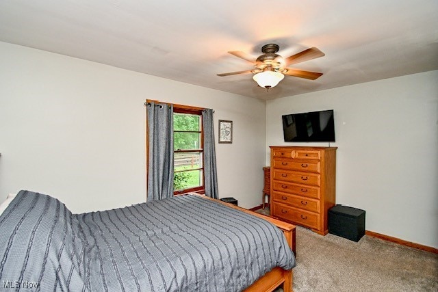 3364 Cormany Rd, Akron, OH 44319 - bedroom with carpet flooring, baseboards, and ceiling fan