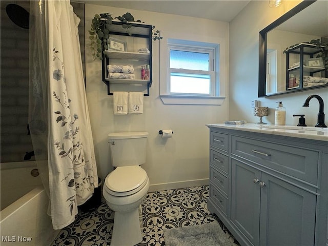 1226 16th St, Parkersburg, WV 26101 - bathroom with vanity, toilet, shower / bath combo, baseboards, and tile patterned flooring