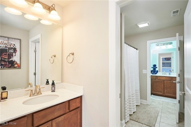 30 Harvester Dr, Copley, OH 44321 - bathroom featuring vanity, tile patterned flooring, baseboards, and a shower with shower curtain