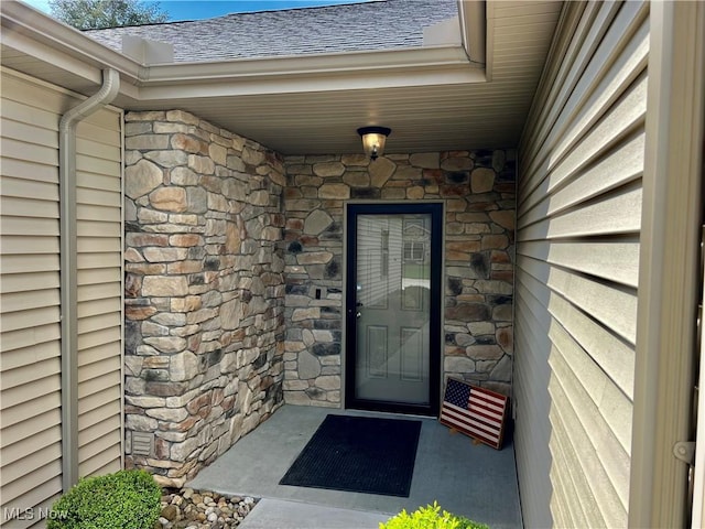 261 Valley View Dr, Weirton, WV 26062 - entrance to property featuring stone siding and roof with shingles