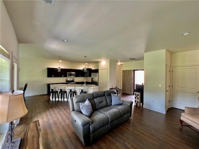 261 Valley View Dr, Weirton, WV 26062 - living room with dark wood-style floors and baseboards