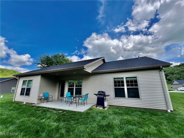 261 Valley View Dr, Weirton, WV 26062 - rear view of house featuring a patio area and a yard