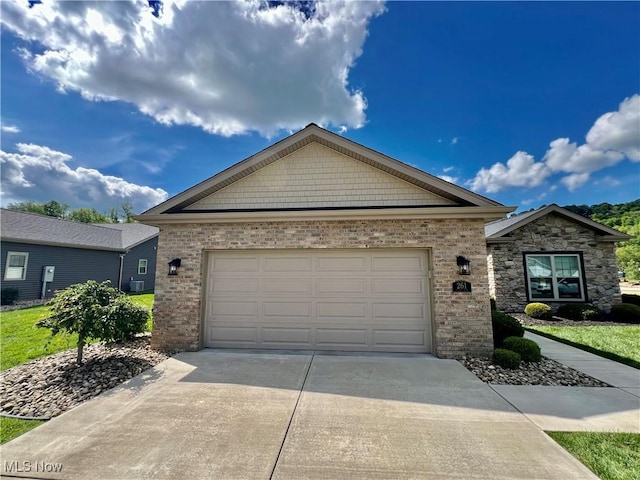 261 Valley View Dr, Weirton, WV 26062 - single story home with driveway, brick siding, and a garage