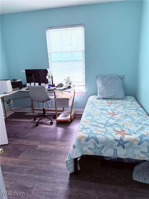 73 Falls River Dr Unit 6, Munroe Falls, OH 44262 - bedroom with wood finished floors, a desk, and baseboards