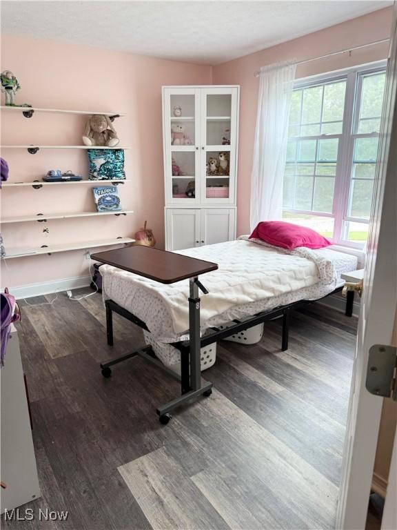 73 Falls River Dr Unit 6, Munroe Falls, OH 44262 - bedroom with wood finished floors