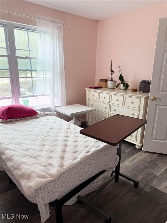 73 Falls River Dr Unit 6, Munroe Falls, OH 44262 - bedroom with dark wood finished floors