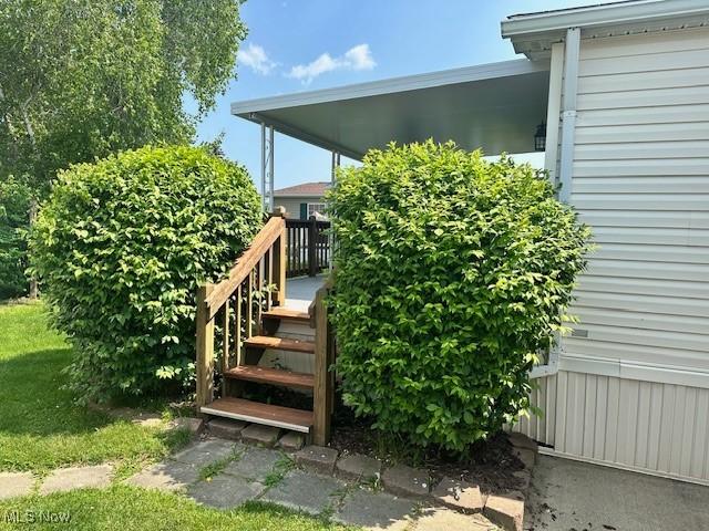 1569 Bogie Ln, Painesville, OH 44077 - property entrance featuring a deck