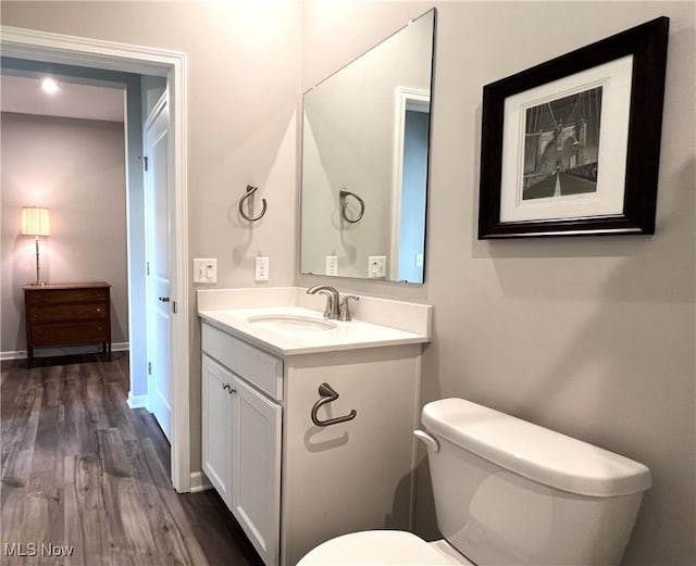 8099 Brookview Ln, Mentor, OH 44060 - half bathroom with vanity and wood finished floors