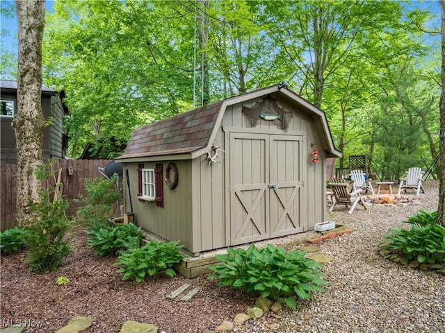 316 Saint Andrews Ln, Senecaville, OH 43780 - view of shed featuring a fire pit