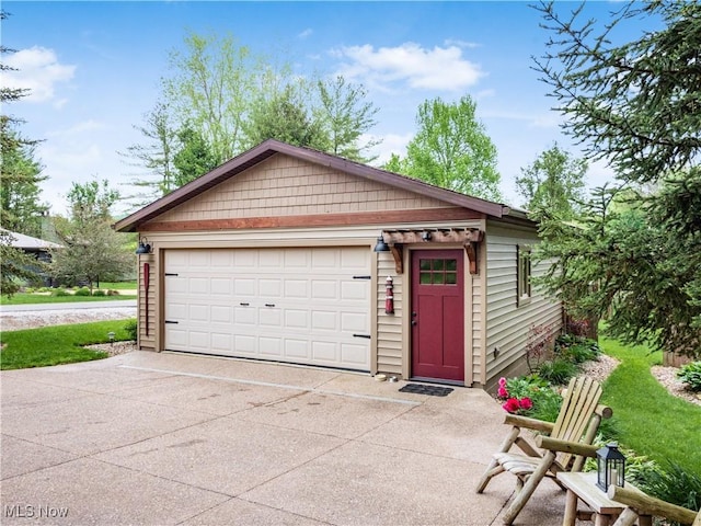 316 Saint Andrews Ln, Senecaville, OH 43780 - view of front of home with a garage and an outdoor structure