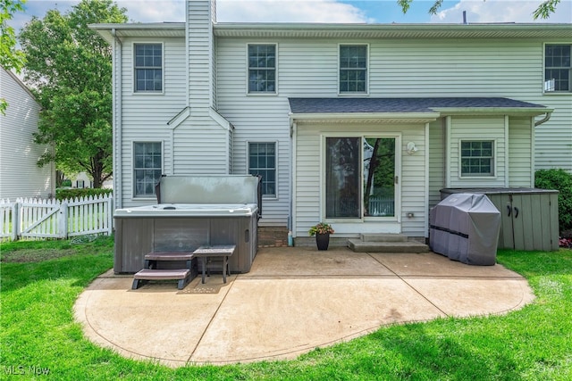 8373 Forest View Dr, Olmsted Falls, OH 44138 - back of property featuring a hot tub and a patio area