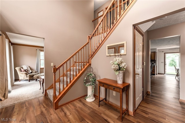 8373 Forest View Dr, Olmsted Falls, OH 44138 - staircase with wood finished floors and baseboards