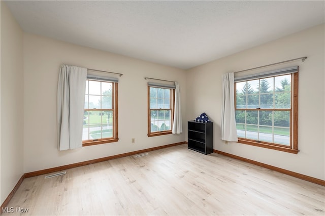 8373 Forest View Dr, Olmsted Falls, OH 44138 - unfurnished room featuring light wood-style flooring and baseboards