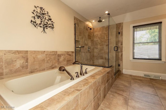8526 Hoyt Ct, Mentor, OH 44060 - bathroom with a stall shower, a bath, tile patterned flooring, baseboards, and recessed lighting