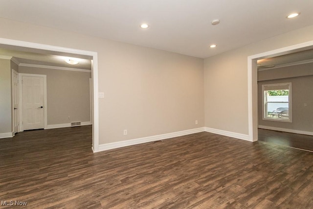 8526 Hoyt Ct, Mentor, OH 44060 - empty room with dark wood finished floors, baseboards, crown molding, and recessed lighting