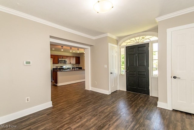 8526 Hoyt Ct, Mentor, OH 44060 - entryway featuring dark wood-type flooring, crown molding, and baseboards