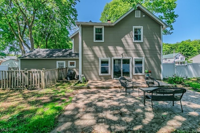 8526 Hoyt Ct, Mentor, OH 44060 - back of house with a patio and a fenced backyard