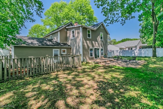 8526 Hoyt Ct, Mentor, OH 44060 - rear view of house featuring a chimney and a patio area