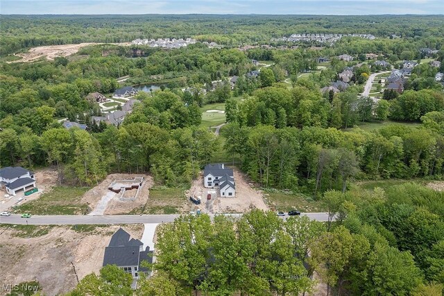 810 Club Dr W, Aurora, OH 44202 - aerial overview of property's location with a heavily wooded area