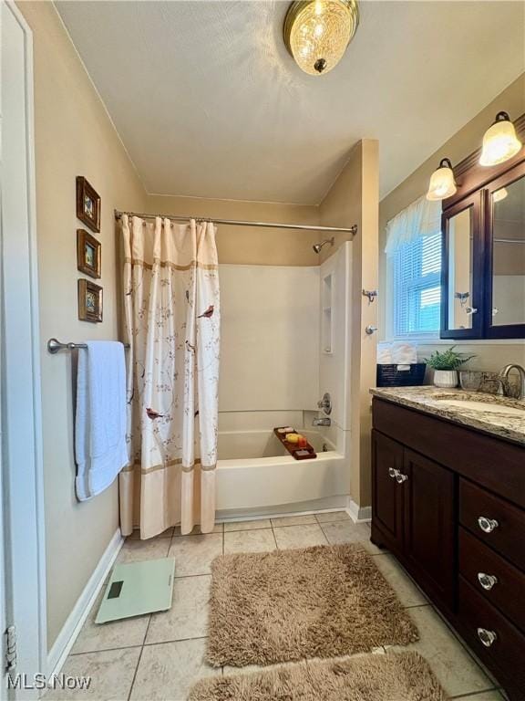 9 Poplar St, Bridgeport, OH 43912 - full bathroom with shower / bath combo, vanity, tile patterned flooring, and baseboards