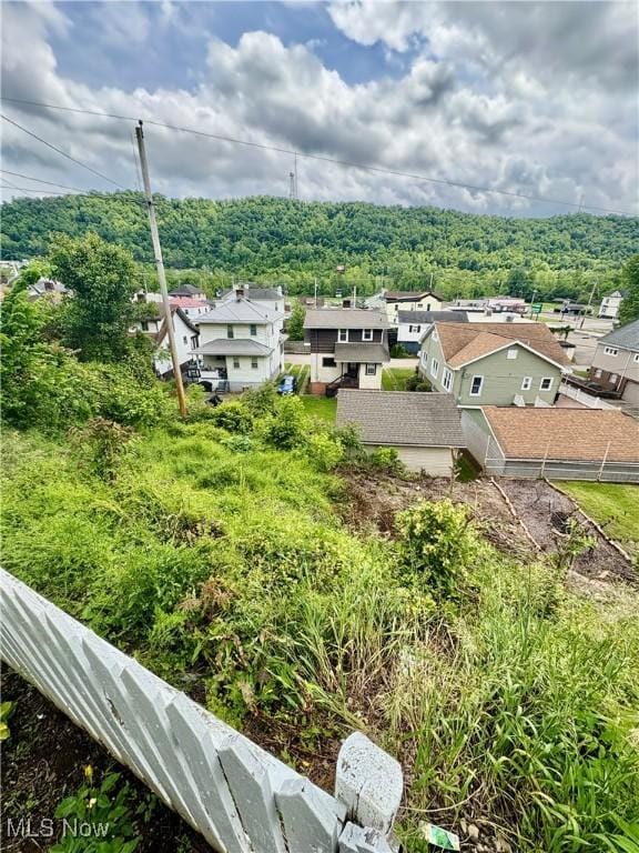 9 Poplar St, Bridgeport, OH 43912 - drone / aerial view of a heavily wooded area