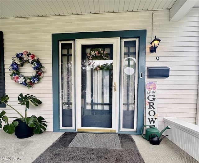 9 Poplar St, Bridgeport, OH 43912 - view of exterior entry featuring covered porch
