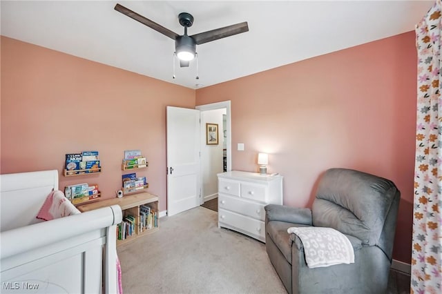 10626 Oakview Dr, Beloit, OH 44609 - living area featuring light colored carpet, ceiling fan, and baseboards