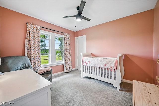10626 Oakview Dr, Beloit, OH 44609 - bedroom with baseboards, carpet floors, and a ceiling fan
