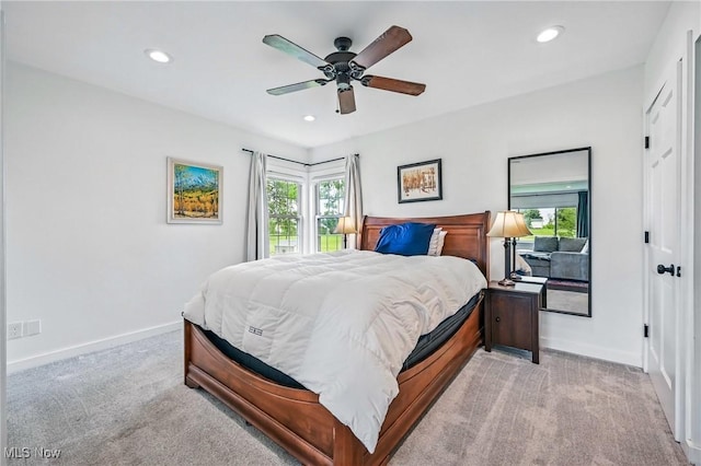 10626 Oakview Dr, Beloit, OH 44609 - carpeted bedroom with multiple windows, baseboards, recessed lighting, and ceiling fan