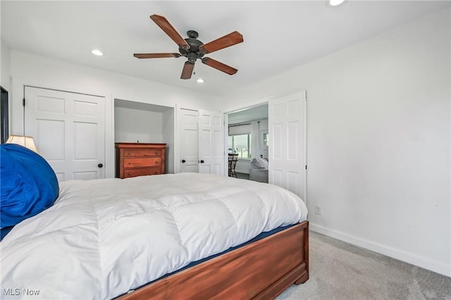 10626 Oakview Dr, Beloit, OH 44609 - carpeted bedroom featuring baseboards, recessed lighting, a ceiling fan, and multiple closets