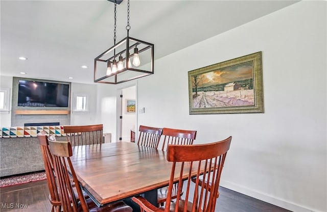 10626 Oakview Dr, Beloit, OH 44609 - dining room featuring wood finished floors, baseboards, recessed lighting, and a chandelier